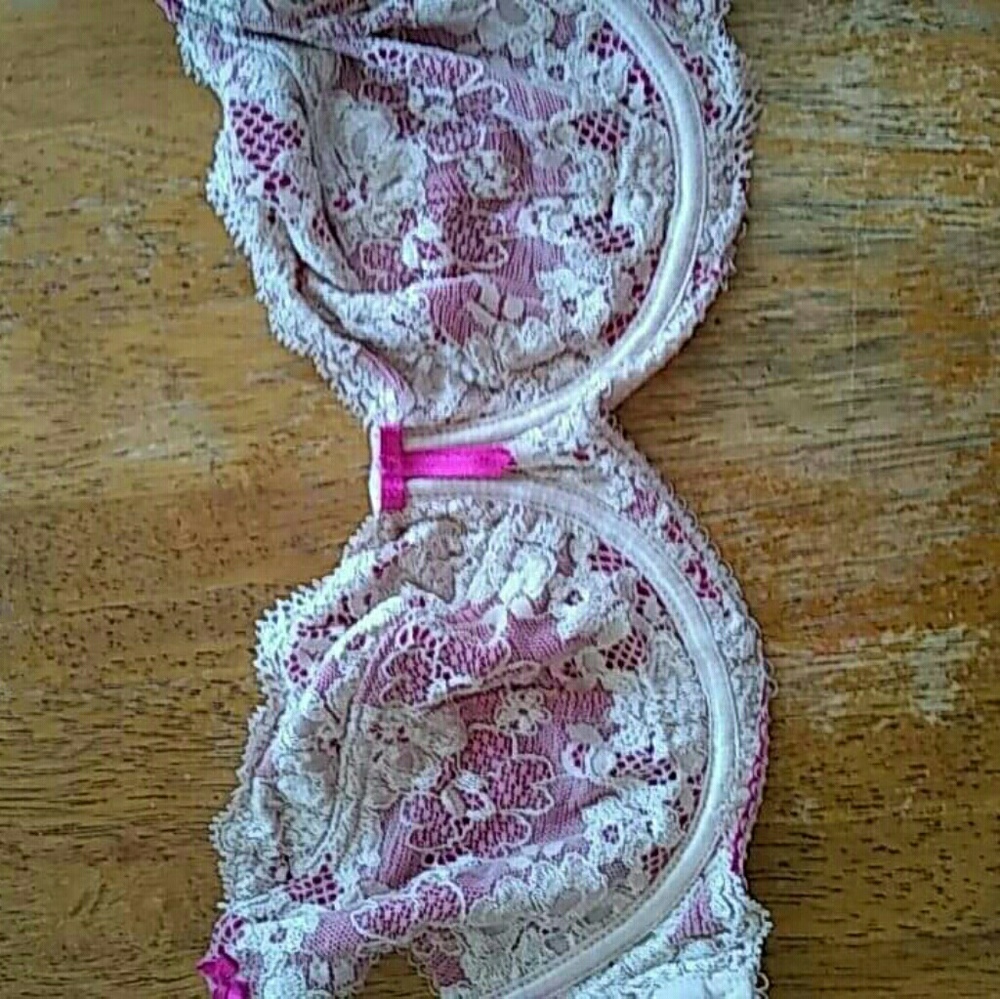 Pink and white lacy bra